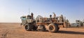 seismic vibrator vehicle starts survey on the desert land area