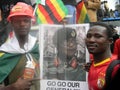 Anti Mugabe protester with potrait of General Chiwenga. Royalty Free Stock Photo