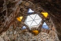 Stained glass decorative window in the form of a six-pointed Star of David in the ceiling of the Cave Church - Lavra Netofa