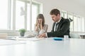 Harassed businesswoman checking the accounts Royalty Free Stock Photo