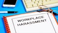 Harassment in the workplace - text inscription in the form of the document. Royalty Free Stock Photo