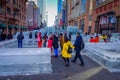 Harbin, China - February 9, 2017: Unknown tourists visiting the ice sculptures in Zhongyang pedestrian street, central