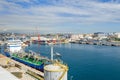 Harbor and the Bay of Gibraltar with its colorful rail cranes, containers, ships and boats