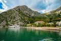 Harbor and beach in sunny day at Boka Kotor bay Boka Kotorska, Montenegro, Europe