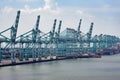 Harbor cargo cranes shipping port equipment, Industrial port crane, Logistics and containers, Cargo freight ship, Cargo sea port Royalty Free Stock Photo