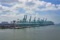 Harbor cargo cranes shipping port equipment, Industrial port crane, Logistics and containers, Cargo freight ship, Cargo sea port Royalty Free Stock Photo