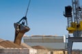 Harbor crane unloading ship Royalty Free Stock Photo