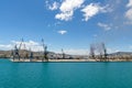 Harbor cranes on greek dock Royalty Free Stock Photo