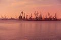 Harbor cranes sunset seascape Royalty Free Stock Photo