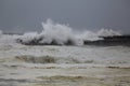 Harbor entry pier and beacon during sea storm