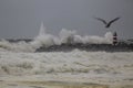 Harbor entry pier and beacon during sea storm