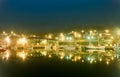 Harbor fishing boats at night with beautiful lights. Siglufjordur, Iceland. Royalty Free Stock Photo