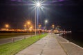 Harbor Lights: Luminous Pathway Along the Dock Royalty Free Stock Photo