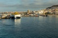 Harbor in Los Cristianos, Tenerife, Spain - May 25, 2019: On the left - Ferry Fred Olsen to La Gomera early morning in the port of