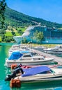 Harbor in Norway - cruise liner MSC Meraviglia and boats marina in Olden by the Nordfjord Royalty Free Stock Photo