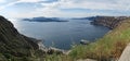 Harbor Ormos Athinios with boats and Volcano Neo Kameni at Santorini Isle (Greece) Royalty Free Stock Photo