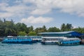 Harbor with passangers boats at the Villingili tropical island Royalty Free Stock Photo