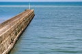 Harbor pier leading out to sea