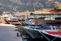 Harbor and port in resort village with moored touristic boats and ships. Marina in Turunc. Boat taxi to move tourists
