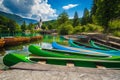 Harbor with rowing boats and colorful canoes, lake Bohinj, Slovenia Royalty Free Stock Photo