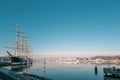 In harbor of TravemÃÂ¼nde lies the old sailing ship Passat in winter and the sky is cloudless and blue