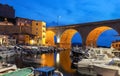 Harbor at Vallon des Auffes with the famous old bridge in Marseille at night, France.