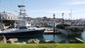 Harbor village, fisherman boats and yachts. Nautical vessel for fishing in port, fishery industry.