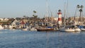 Harbor village, yachts sailboats in marina. Nautical vessels in sea port. Oceanside, California USA.