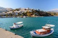 Harbour of Aghia Galini town with parked fishing boats and beautiful houses on the rocks at Crete island, Greece Royalty Free Stock Photo