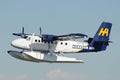 Harbour Air Float Plane taking off in Vancouver, Canada. Royalty Free Stock Photo