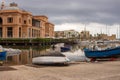 Harbour with boats and and yachts in Bari, southern Italy. Marina landscape. Palace and port in Bari. Mediterranean seafront.