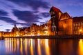 Harbour crane and city gate Zuraw, Gdansk, Poland Royalty Free Stock Photo