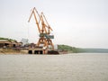 Harbour cranes for loading cargo ships Royalty Free Stock Photo