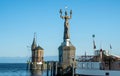 Harbour entrance of Konstanz with lighthouse and the statue of Imperia, Lake Constance (Bodensee). Royalty Free Stock Photo