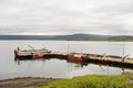 The harbour in Holmavik city in Iceland with rusty boats