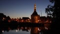 Harbour of Hoorn with sailboats at evening and the Hoofdtoren. Hoorn is harbor town at the Markermeer dating back to the