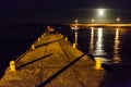 Harbour Lights with full moon rising Royalty Free Stock Photo