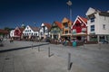 Harbour and pier of Stavanger with colorful timber houses and bars in Norway