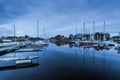 Harbour quay in historic city of Carentan, France at twilight