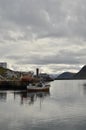 Harbour with smal fishing boats Norway rough cold wet Royalty Free Stock Photo