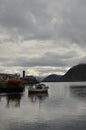 Harbour with smal fishing boats Norway rough cold wet Royalty Free Stock Photo