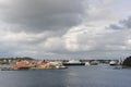 Harbour in Stavanger, Norway on a cloudy day with boats and ferries in the North Sea