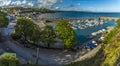 The harbour and village of Saundersfoot, Wales highlighted by the evening sun Royalty Free Stock Photo