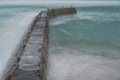 Harbour wall, Sennen Cove, Cornwall. England. Long exposure. Royalty Free Stock Photo