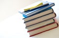 Hard back books with pen and notelet Royalty Free Stock Photo