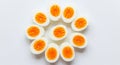 Hard Boiled Eggs Halves Arranged in a Circle on White Royalty Free Stock Photo