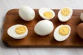 Hard Boiled Eggs on a rustic wooden board, low angle view. Close-up Royalty Free Stock Photo