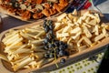 Hard cheese and grapes platter at a local brunch in Moldova