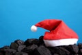 Hristmas symbols on a black coal heap.