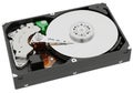 Hard disk drive with cover removed exposing internal components and platter Royalty Free Stock Photo